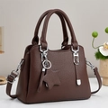 Elegant dark brown pebble leather tote bag with star pendant and adjustable strap - Coffee