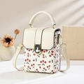 Mini cherry print phone bag in beige faux leather with golden metallic twist lock - White