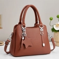 Brown litchi grain leather tote bag with star charm and silver hardware for women - Earthy Yellow