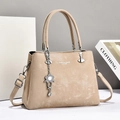 Elegant beige PU leather handbag with flower pendant and adjustable shoulder strap - Light Khaki