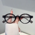 Retro round frame glasses in dark grey translucent resin with metal rivet accents - Clear Gray Frame Clear Lens