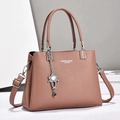 Elegante malvenfarbene Lederhandtasche für Damen mit Griffen und verstellbarem Riemen - Rosa