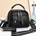 Black lychee textured leather tote bag with stylish black and white woven wide strap - Black