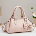 Pink lychee grain leather handbag with top handles and a detachable crossbody strap - Pink