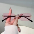 Rimless sunglasses with light pink tinted lenses and gold metal temples with rhinestone detail - Black Gold Frame Pink Lens