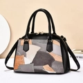 Minimalist black faux leather tote with colorful geometric patterns and gold hardware - Gray
