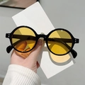Retro round black sunglasses with yellow lenses and metallic dot accents for women - Black Frame Yellow Lens