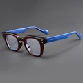 Detailed side view of retro square tortoise frames with contrasting blue temples and rivets - Tea Frame Transparent Lens Navy Blue Legs