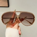 Occhiali da sole aviator chic con lenti sfumate tè e montatura marrone trasparente - Montatura Champagne Lente Marrone Sfumato