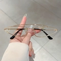 Gafas cat-eye de montura metálica dorada con doble puente y patillas negras - Montura Dorada Lente Transparente