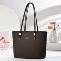 Brown large capacity tote bucket bag with gold logo and woven texture finish - Coffee