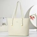 Detailed view of cream tote bag with lychee texture and elegant gold brand logo - Off-white