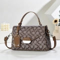Classic brown patterned mini square handbag with top handle and adjustable shoulder strap - Khaki Oval Pattern