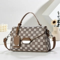 Detail of checkered crossbody bag with silver buckle and leather handle - Khaki Grid