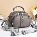 Gray lychee grain leather tote bag with three zipper pockets and a wide patterned strap - Gray