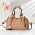 Elegant camel lychee leather handbag with heart chain and adjustable crossbody strap - Khaki