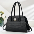 Chic black crocodile embossed handbag with bow decoration and adjustable shoulder strap - Black