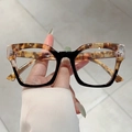 Gafas de luz azul cat-eye con montura bicolor en carey y negro con detalle de metal lateral - Empalme de Leopardo Negro