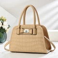 Elegant beige crocodile pattern handbag with bow detail and silver metal clasp - Khaki