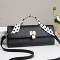 Classic black lychee grain leather handbag with silk scarf handle and metal lock accent - Black
