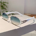 Détail de lunettes de soleil ovales rétro avec verres dégradés bleu-jaune et monture blanche - Monture Argent Dégradé Bleu-Jaune