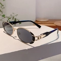 Vue latérale de lunettes de soleil ovales rétro avec monture dorée et branches - Monture Dorée Verres Gris