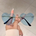 Fashionable heart-shaped rimless sunglasses with blue translucent jelly lenses and gold frames - Blue