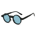 Macro view of retro round sunglasses with thick black frames and light blue lenses - Black Frame Light Blue Lens