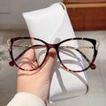 Cat eye tortoiseshell glasses with gold metal temples and a white triangular case - Tea Print Gold Frame (Clear Lens)
