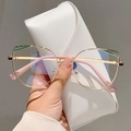 Rose gold cat eye glasses with green trim and pink temples on white leather case - Gold Frame Green Edge Pink Leg