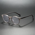Occhiali rotondi vintage con montatura tortora traslucida e stanghette in legno marrone scuro - Grigio Trasparente (Gambe In Legno Grigio)