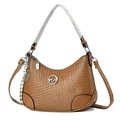 Detail of brown woven shoulder bag with silver circular logo and tassel charm - Khaki