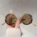 Occhiali da sole ovali chic leopardati con stanghette dorate e lenti marrone chiaro - Montatura Verde Floreale Lente Champagne