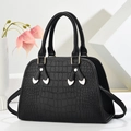 Elegant black crocodile pattern tote bag with gold heart hardware and shoulder strap - Black