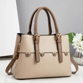 Schicke beige Handtasche aus Leder mit dunkelbraunen Griffen und goldenen Beschlägen - Khaki