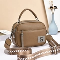Brown textured leather handbag with silver S logo and wide geometric woven strap - Khaki