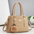 Sac à main élégant abricot texture crocodile avec pompon et bandoulière réglable - Abricot