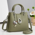 Dark green lychee pattern leather bucket bag with elegant shell and pearl metal pendant - Dark Green