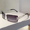 Detail view of rectangular sunglasses with purple gradient lenses and crystal hinges - Silver Frame Gradient Gray Lens Silver Accessories White Rhinestone Black Foot Cover