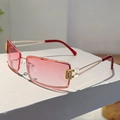 Detail of Y2K rectangle sunglasses with pink gradient lenses and gold hollow metal arms - Gold Frame Gradient Pink Lens Gold Accessories Pink Rhinestone Transparent Red Foot Cover