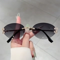 Rimless oval sunglasses with grey gradient lenses and gold metal hardware finish - Gold Frame Gradient Grey Lens