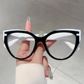 Montatura cat-eye bicolore bianco e nero con dettaglio delle aste a forma di F - Montatura Bianco Nero Lente Trasparente Asta Bianca