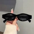 Gafas de sol ovaladas negras minimalistas retro con acabado brillante y elegante - Montura Negra Lente Gris