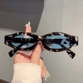 Gafas de sol ovaladas con montura carey blanco y negro y cristales azul claro - Marco Carey Lentes Azules