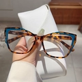 Cat eye glasses in tortoiseshell and blue color block with white leather case - Cat Eye Flat Glasses (Includes White Case) / Blue Leopard