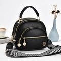 Mini borsa nera in pelle a grana con tracolla larga a spina di pesce e tre zip - Nero