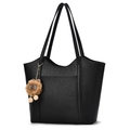 Black pebbled leather tote bag for women with lion plush charm on white background - Black