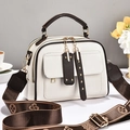 White lychee leather handbag with brown handles and a clover pattern jacquard strap - White