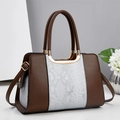 Chic two-tone brown leather handbag with white embossed pattern and gold hardware - Silver