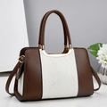 Chic two-tone faux leather handbag with snakeskin texture and gold hardware details - Off White